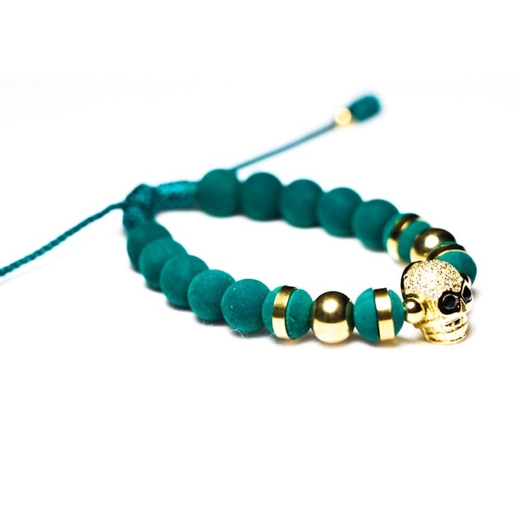 Teal And Gold Skull